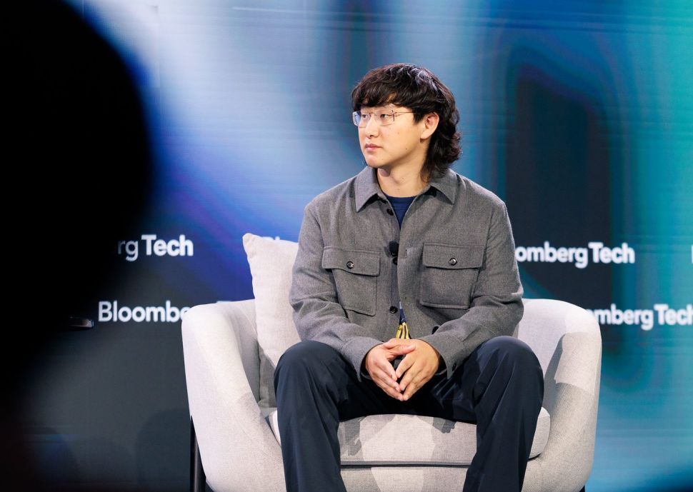 Alexandr Wang wearing a gray jacket onstage