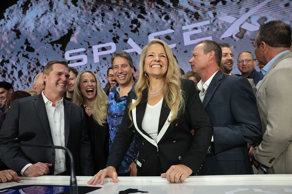 Gwynne Shotwell (C), President of SpaceX, is joined by company leadership as they ring the opening bell at the Nasdaq Marketsite at the launch of the company's initial public offering (IPO) on June 12, 2026 in New York City. 
